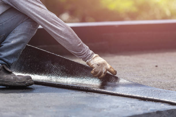 Professional Basement Waterproofing technician working in Englewood Cliffs, NJ